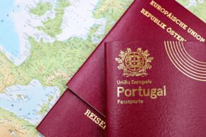 European Passports on Top of Europe's Map (Austria, Germany and Portugal Passports)