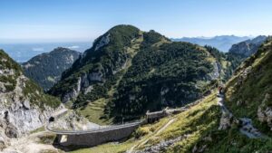 Captivating view of Wendelstein Mountain with hiking trail and railway in Bavaria, Germany.